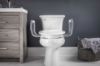 Picture of Bemis Assurance with CleanShield 3" raised toilet seat, with arms